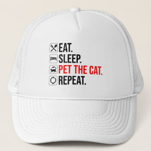 Casquette Manger. Dormir. Caresser le chat. Répéter