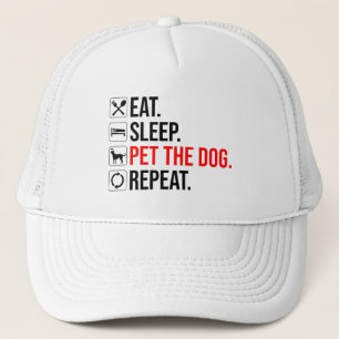 Casquette Manger. Dormir. Caresser le chien. Répéter