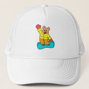 Casquette Ours aux sports de snowboard