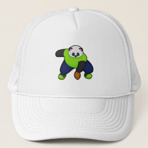 Casquette Panda comme joueur de football avec football