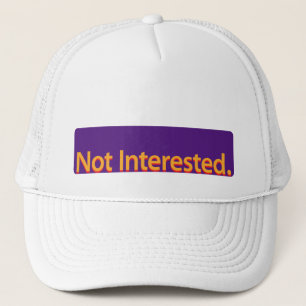 Casquette Pas Intéressé. Texte orange