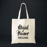 Casual Script Maid of Honour Monogram Favour Tote Bag<br><div class="desc">Trend typography monogram tote bag. Modern and stylish, this custom design features the text "Maid of Honour" in casual script lettering and an editable text field for a name in elegant sans serif in black. Easily personalize this design to match your style by clicking "Customize" to go to the design...</div>