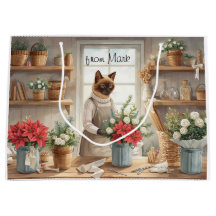 Cat arranging Winter Flowers for Christmas 