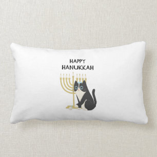 cat celebrating hanukkah and playing with a dreide lumbar pillow