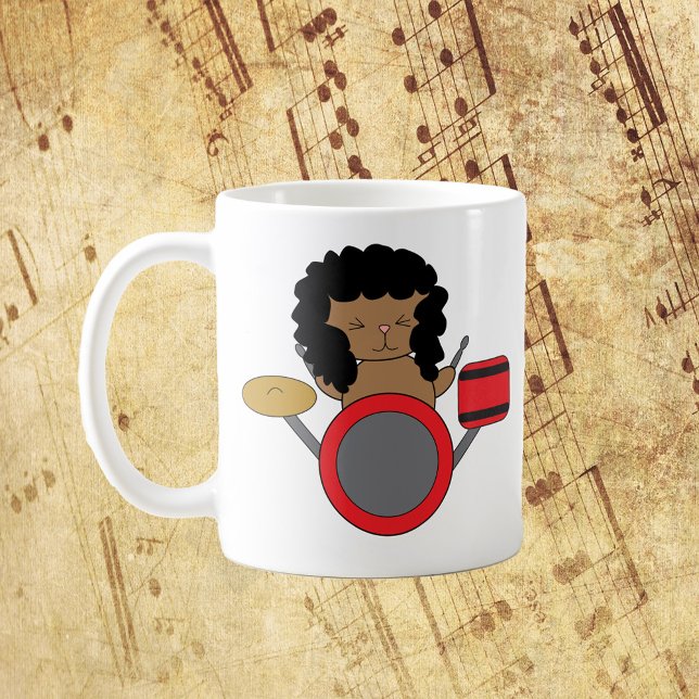 Cat Drummer 80s Hair Band Coffee Mug (A mug with a cat playing drums dressed up as a member of a 1980s metal hair band.)