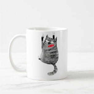 cat hanging  coffee mug