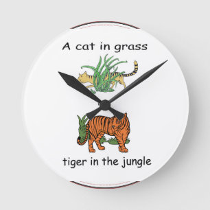 Cat in Grass is a Tiger in the Jungle Round Clock