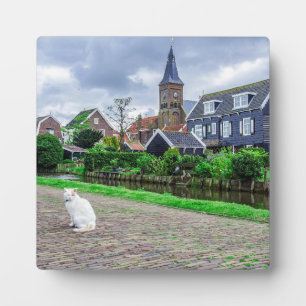 Cat in traditional fishing village plaque