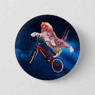 Cat jump on a bike 2 inch round button