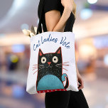 Cat Ladies Vote Script Feminist Rustic Bold Cute Tote Bag<br><div class="desc">“Cat ladies vote”. Stand proud and share your support for Kamala Harris whenever you go shopping with this cute, fun, graphic, feminist tote bag. A cute rustic country cat illustration in black, red, white and turquoise blue and navy blue handwritten script typography overlay a white background. Prove Vance wrong, proudly...</div>