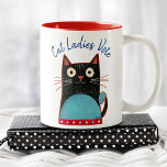 Cat Ladies Vote Script Rustic Bold Cute Feminist Two-Tone Coffee Mug<br><div class="desc">“Cat ladies vote”. Stand proud and share your support for Kamala Harris whenever you drink out of this cute, fun, graphic feminist coffee mug. A cute rustic country cat illustration in black, red, white and turquoise blue and navy blue handwritten script typography overlay a white background. Prove Vance wrong, proudly...</div>