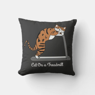 Cat on a treadmill throw pillow