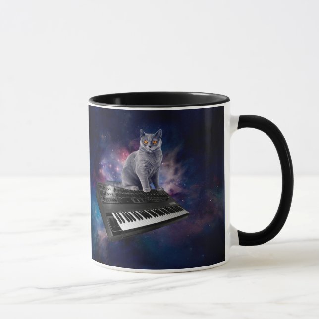 Cat on synthesizer in space mug (Right)