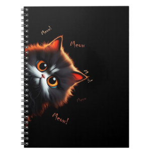 Cat peeping notebook