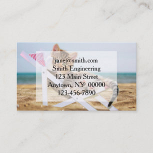 Cat resting on a sun lounger business card