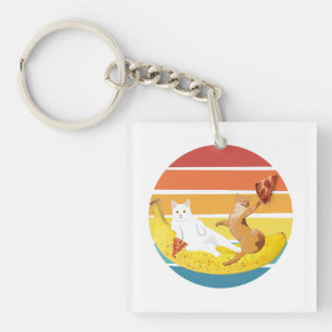 Cat riding banana and holding pizza retro keychain