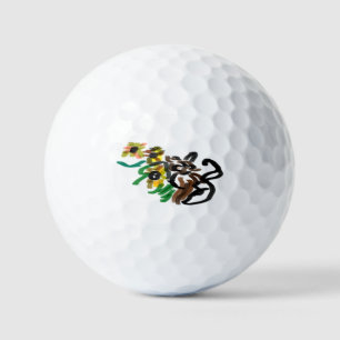 Cat sunflowers golf balls