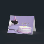 Cat wearing birthday hat blowing out candles card<br><div class="desc">Cat wearing birthday hat blowing out candles on birthday cake | Steven Puetzer | AssetID: sb10064212b-001</div>