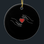 Catching Heart Ceramic Ornament<br><div class="desc">Capture the essence of love and connection. 'Catching Heart' symbolizes the beauty of moments that steal your heart away.</div>
