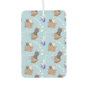 Cats in box and milk drops on blue air freshener