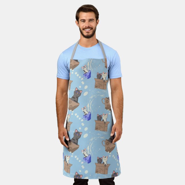 Cats in box and milk drops on blue apron (Worn)