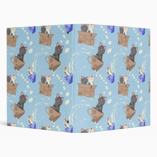 Cats in box and milk drops on blue binder