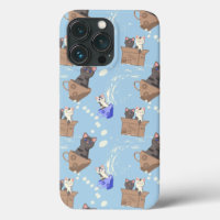 Cats in box and milk drops on blue