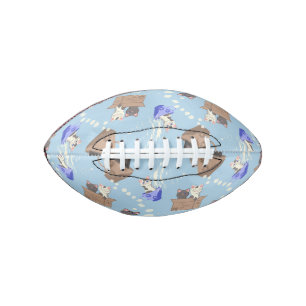 Cats in box and milk drops on blue football
