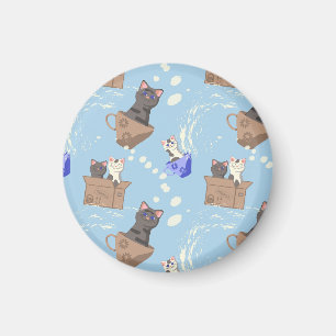 Cats in box and milk drops on blue magnet