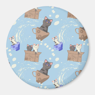 Cats in box and milk drops on blue magnet