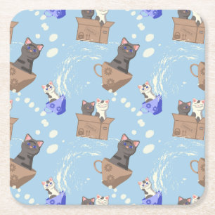 Cats in box and milk drops on blue square paper coaster