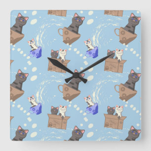 Cats in box and milk drops on blue square wall clock
