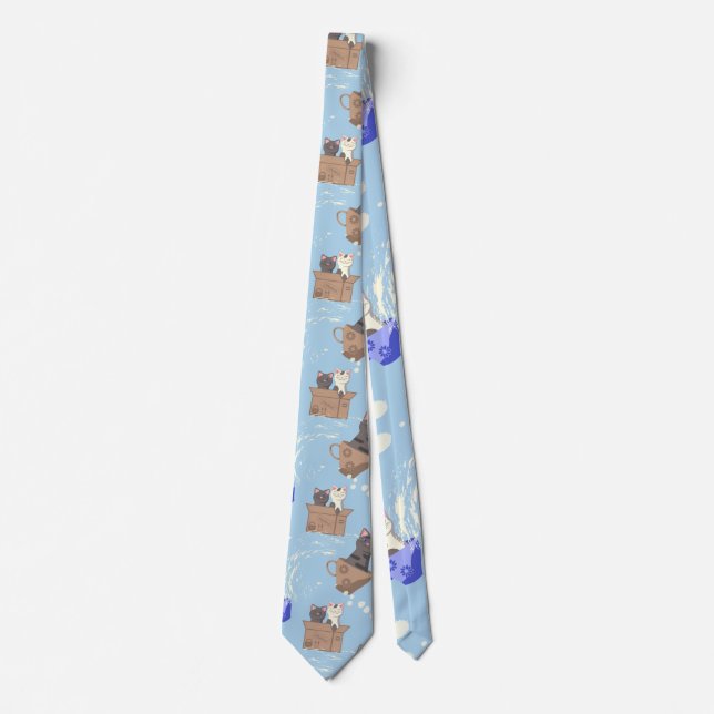 Cats in box and milk drops on blue tie (Front)