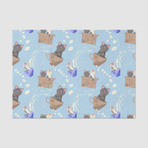 Cats in box and milk drops on blue tissue paper