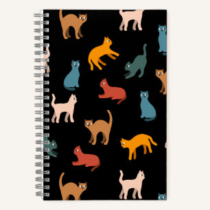 Cats on the black notebook