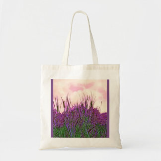 Cattails with dramatic pink sky and purple leaves tote bag