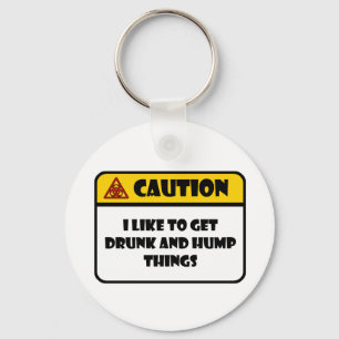 CAUTION - I LIKE TO GET DRUNK AND HUMP THINGS KEYCHAIN