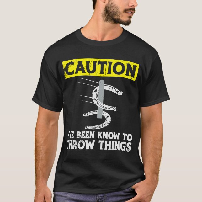 Caution i've been known to throw things horseshoe  T-Shirt (Front)