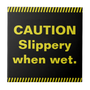 Caution. Slippery when wet. Tile