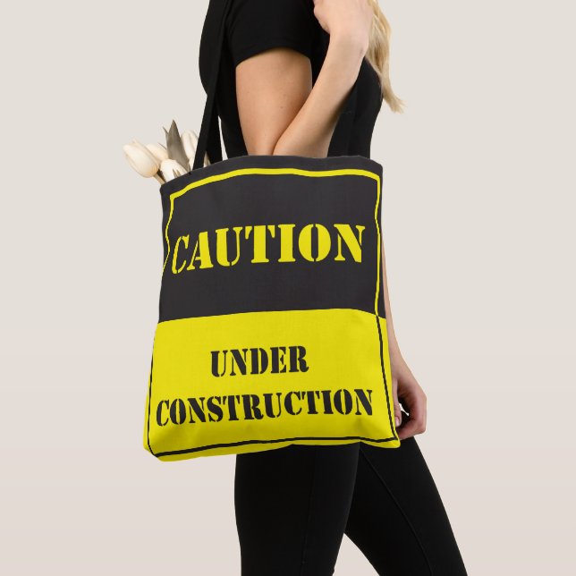 caution under construction sign tote bag (Close Up)