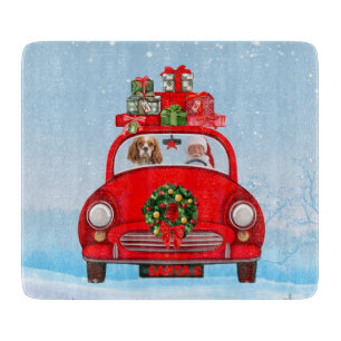 Cavalier King Dog In Car With Santa Claus Cutting Board