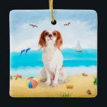 Cavalier King Dog on Beach Ceramic Ornament<br><div class="desc">Cute dog sitting on beach is a perfect gift idea for someone who love this dog breed.</div>