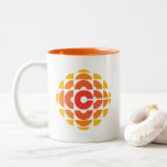 CBC 1974 Logo Two-Tone Coffee Mug<br><div class="desc">Created by Burton Kramer, a designer and artist whose work is featured as part of the permanent collection at the Smithsonian Institute. Sometimes called the exploding pizza or pineapple, Burton Kramer's modernist logo features the letter "C" for Canada at its core. According to the CBC's 1974 corporate manual, "the overall...</div>