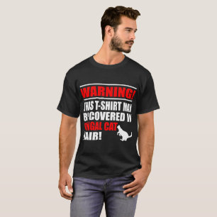Ce T-shirt peut couvert dans des cheveux de chat