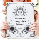 Celestial Sun and Moon Custom Name Manifestation  Planner<br><div class="desc">This enchanting design features celestial-inspired illustrations of the sun, moon, and stars, paired with blooming sunflowers and cosmic motifs. The bold black-and-white artwork creates a mystical and empowering vibe, perfect for manifesting goals and harnessing positive energy in 2025. Personalized with a custom name, this design is ideal for astrology enthusiasts,...</div>