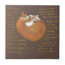 Ceramic tile showing sleeping cat