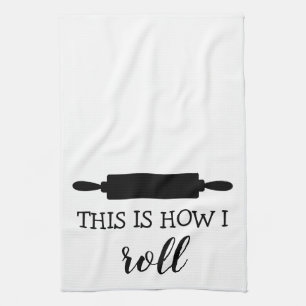 C'est comment je roule la serviette de cuisine de