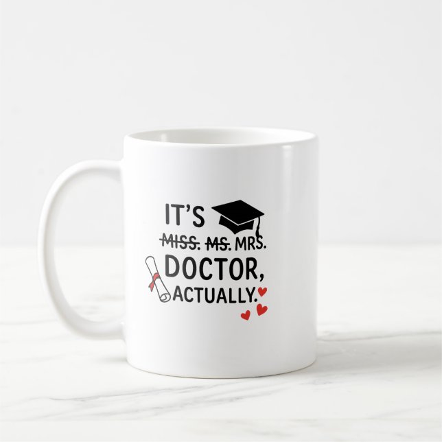 C'est Docteur en fait Graduation Mug (Gauche)