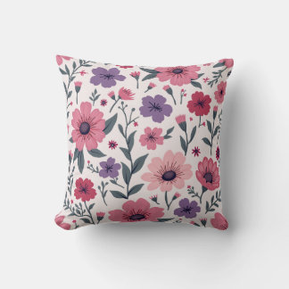 C'est un coussin mélangé avec des fleurs roses et 