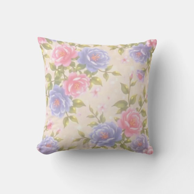 C'est un coussin plein de motifs de fleurs. (Recto)